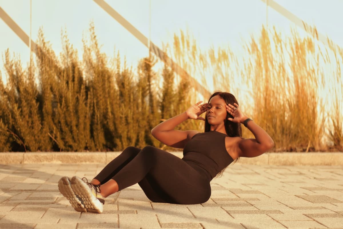 Jane doing a sit-up outdoors